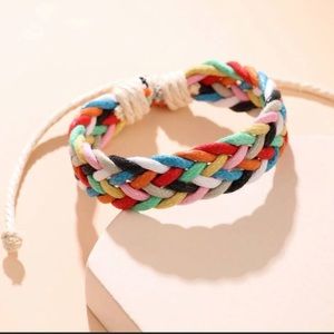 Boho multi colored adjustable braided bracelet.